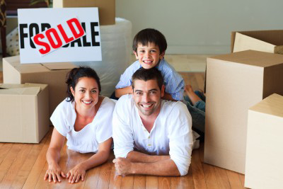 family under boxes